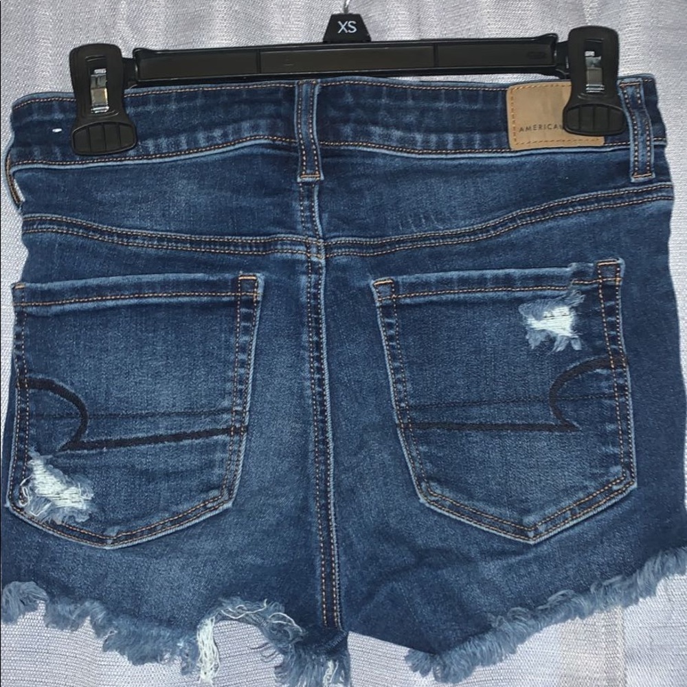 shorts above mid thigh